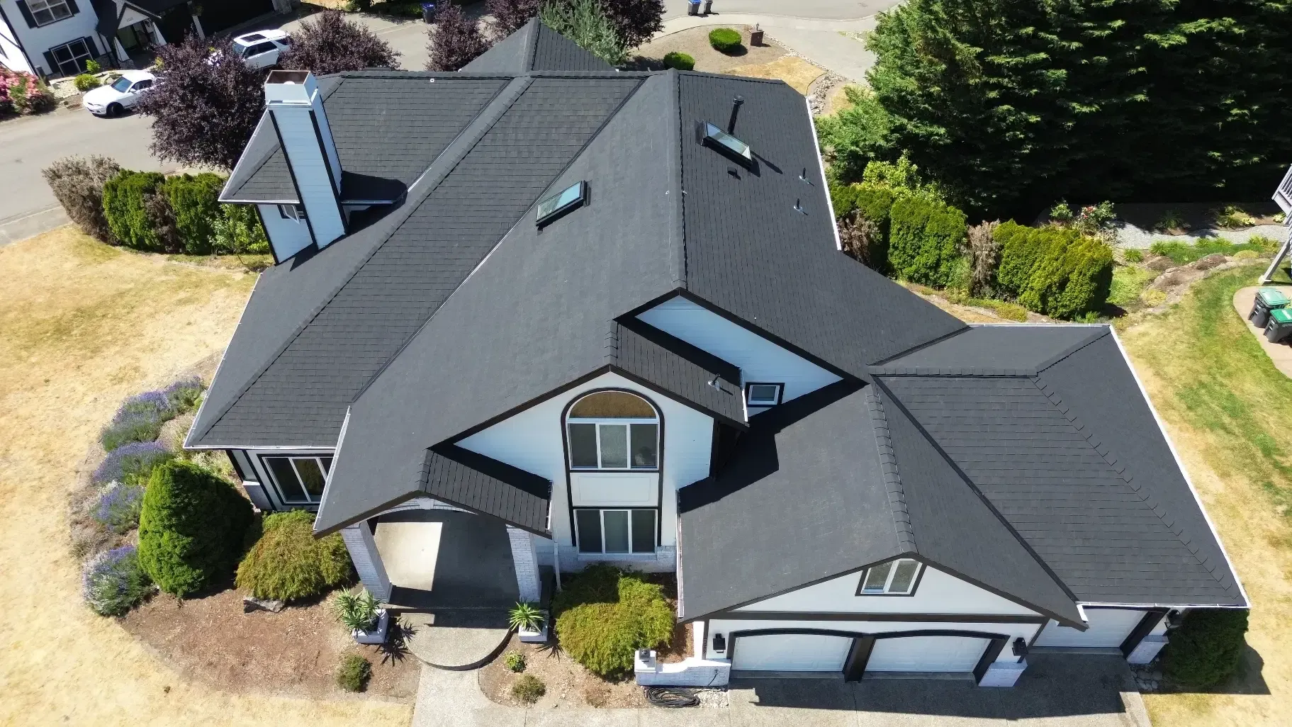 Completed charcoal roof replacement viewed from above